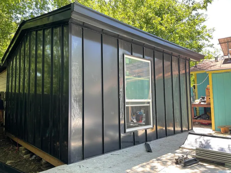 Black standing seam metal wall panels for Roof Inspection in Brooklyn Park